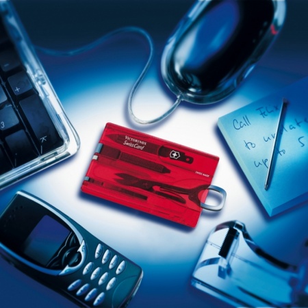 Kieszonkowy zestaw narzędzi Victorinox Swisscard Classic transparentny czerwony